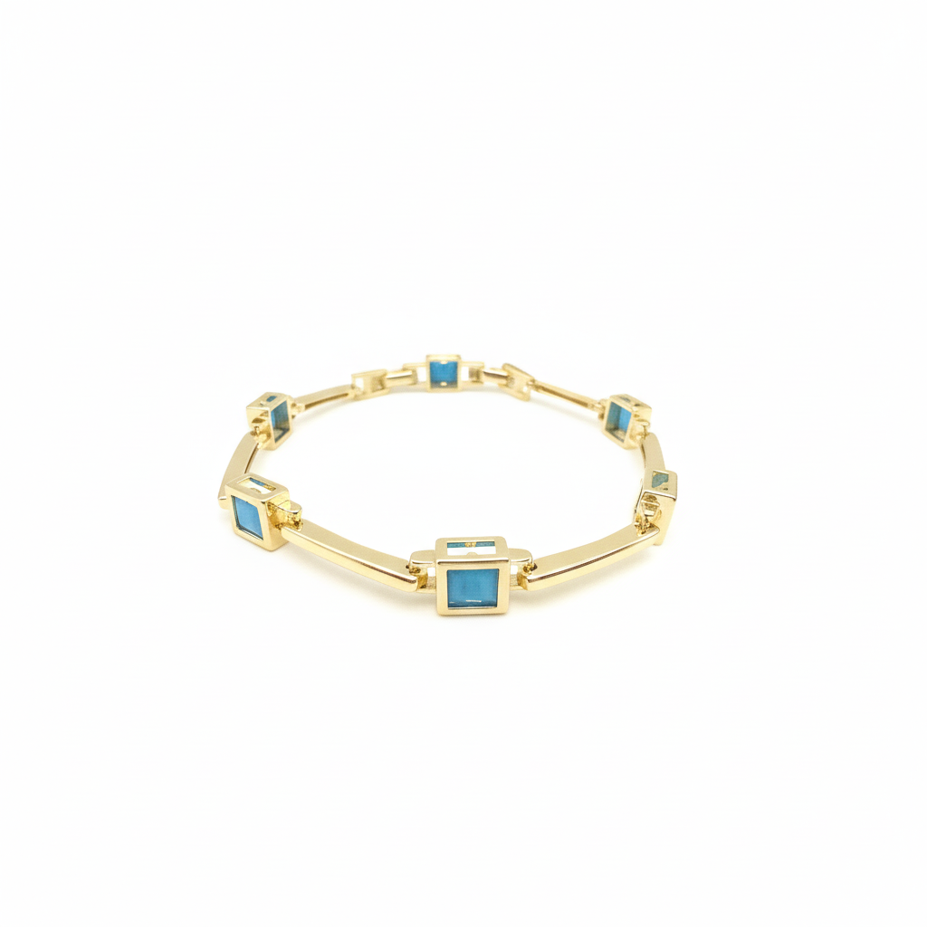Elegantes Goldfarbenes Armband Mit Türkisen Quadratischen Steinen