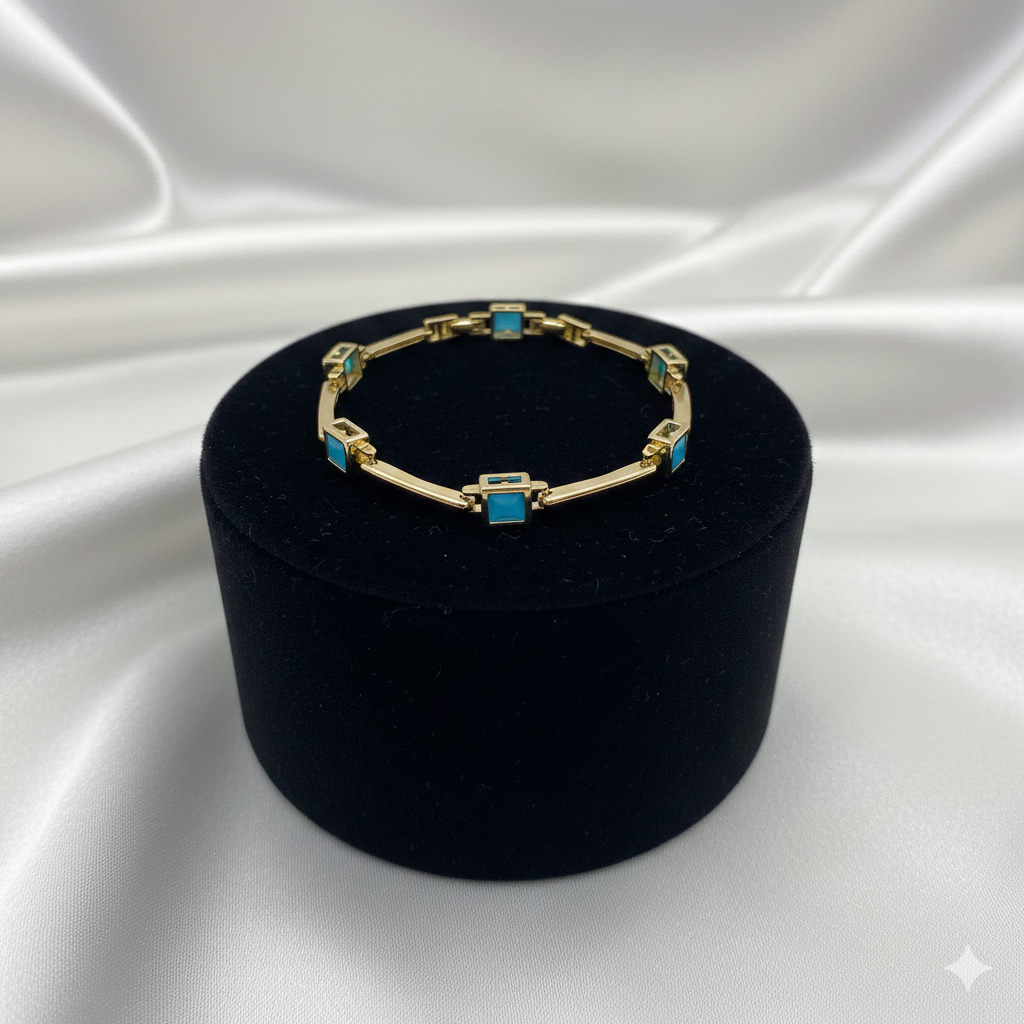 Elegantes Goldfarbenes Armband Mit Türkisen Quadratischen Steinen