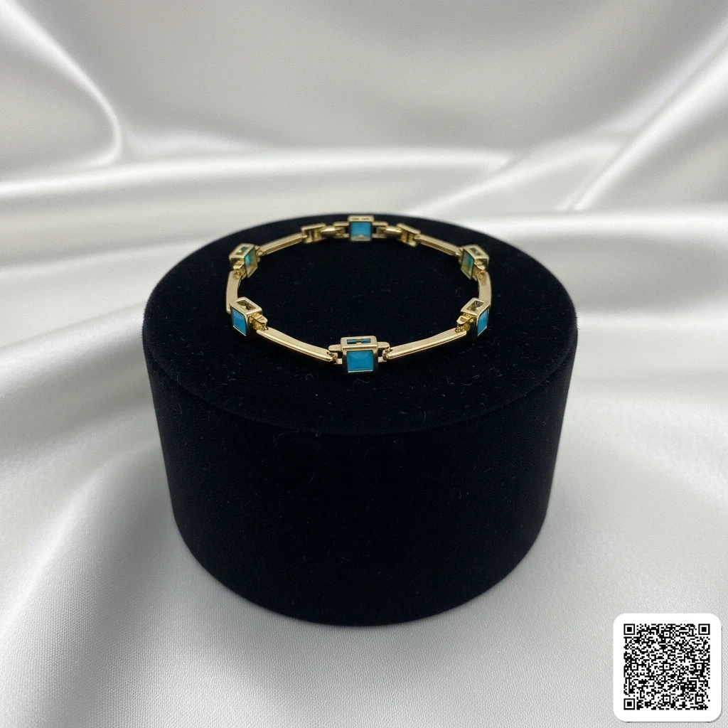 Elegantes Goldfarbenes Armband Mit Türkisen Quadratischen Steinen