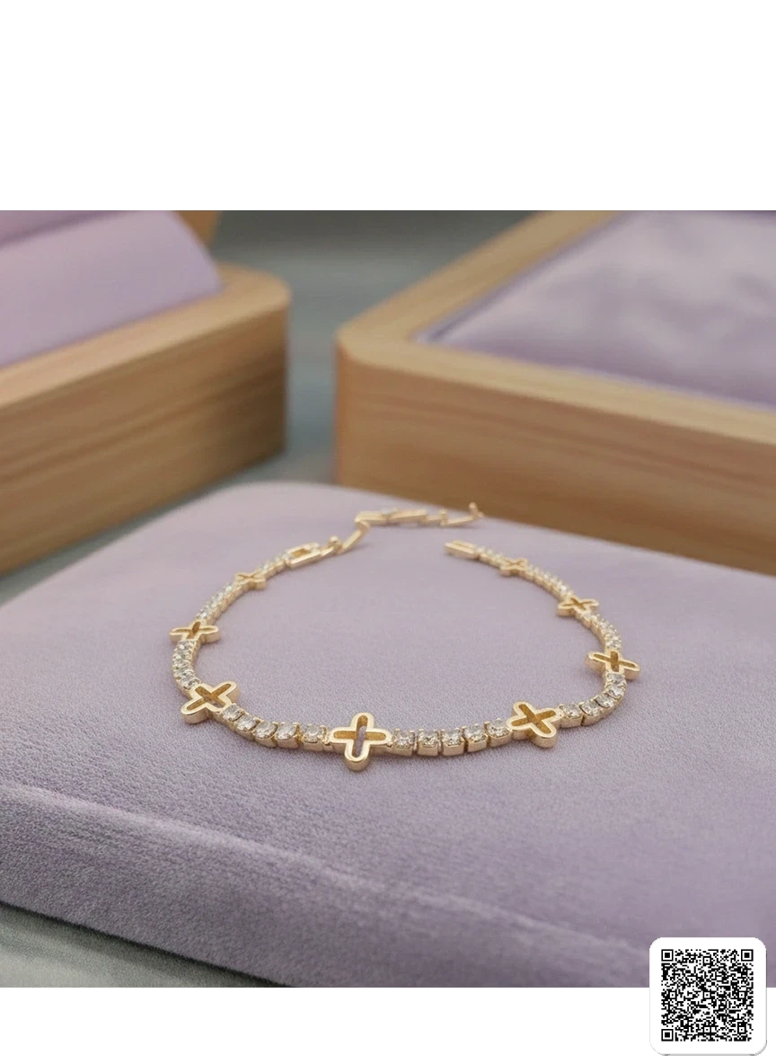 Elegantes Tennisarmband Mit Kleeblatt-Design Und Zirkonia In Gold