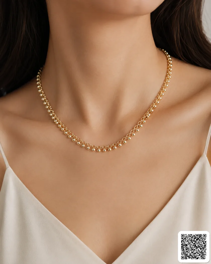 Elegante Goldfarbene Perlenkette Mit Feinem Kugel-Gliederdesign