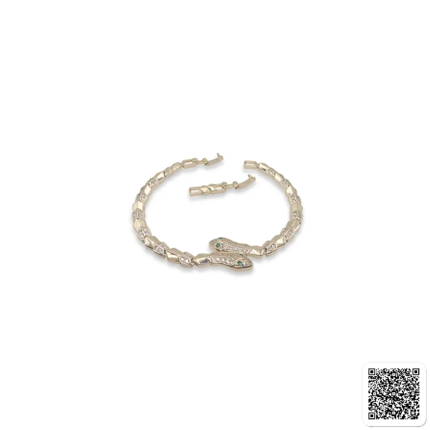 Elegantes Goldfarbenes Armband Mit Strass Und Grünem Stein