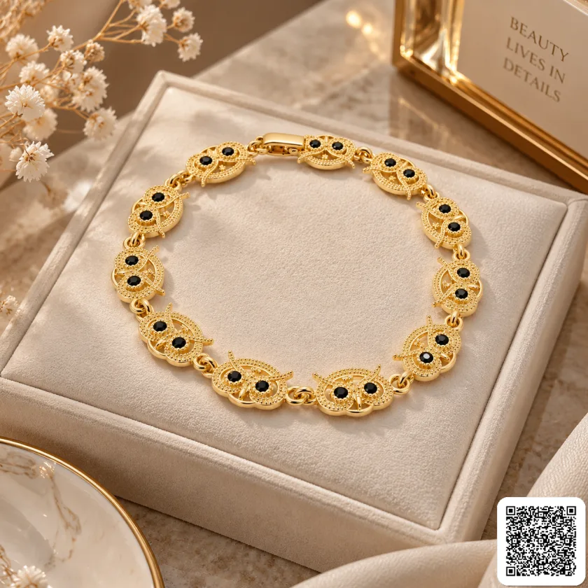 Goldfarbenes Eulen-Armband Mit Schwarzen Akzenten